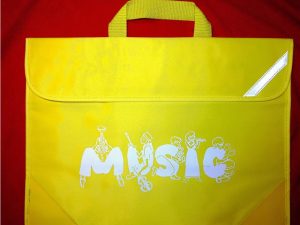 Music Bag by MacPac – Yellow with Music Motif